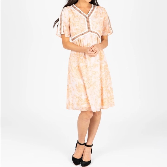 The Kenley detail empire waist in peach. - Picture 5 of 5